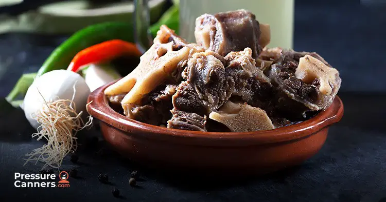 a bowl with bones and other veggies