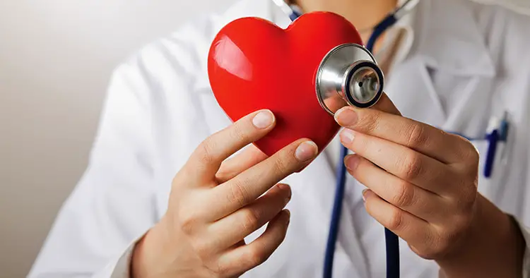 doctor-stethoscope-examining-red-heart-isolated