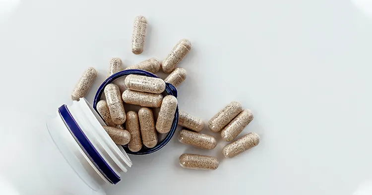 topview of super enzymes capsules in the jar, with negative space