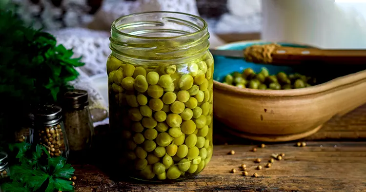 Canned peas in a jar on a table