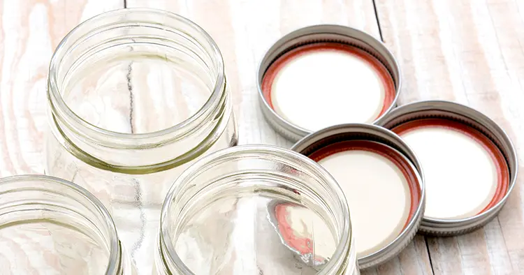 Closeup of three glass canning jars