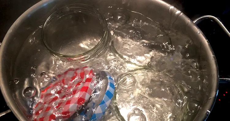 Sterilizing glass jars in a steel pan