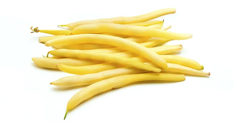 wax beans on white background