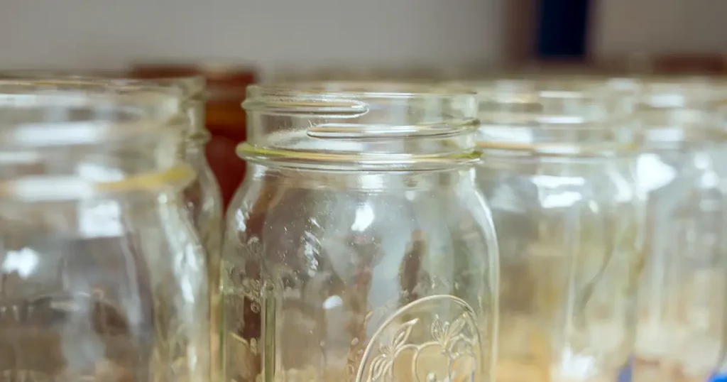 Empty glass canning jars for pressure cooking preservation of food